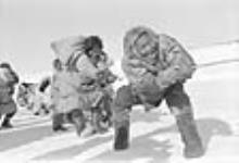 Inuit rope-pulling contest - Sports Day. 1953.