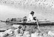 Eskimos with kayak. 1951.