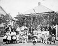 [Group of Okinawan residents of Hardieville, Alberta.]. [1924]