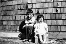 [Eugene Hattori, first child born in Lethbridge, Alta., of Japanese evacuee parents, and his sister Susan. ca. 1948