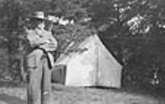 John King at tent. ca. 1901