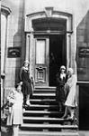 [Four women on steps of Finnish immigrant home, Finnish Seamen's and Immigrant Mission, Montréal, (Québec): Bottom right: Anne Wallace Nasi.  Bottom left: Lyyli Eleonoora Nasi.  Top right: Lempi Maria Nasi]  [c 1929]
