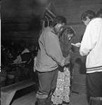 Inuuk couple getting married at Kuujjuaq (formerly Fort Chimo), Quebec]
  July 1951.