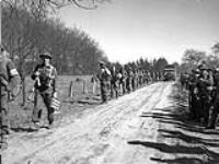 Infantrymen of The North Nova Scotia Highlanders advancing near Dorterhoek, Netherlands, 8 April 1945 Apri1 8, 1945.