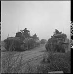 Tanks move into position for attack toward Falaise, between Hubert-Folie and Tilly-la-Campagne. 8 Aug. 1944