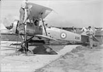 Groundcrew washing Avro 626 aircraft 225 of No.111(CAC) Squadron, R.C.A. F. 2 June 1939