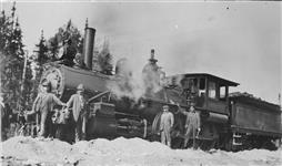 Unidentified men with locomotive. n.d.