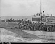 LCI(L) 135 of the 2nd Canadian (262nd RN) Flotilla carrying personnel of the North Nova Scotia Highlanders and the Highland Light Infantry of Canada en route to France on D-Day. 6 June 1944