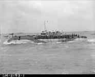 ndI(L) 135 of the 2nd Canadian (262nd RN) Flotilla carrying personnel of the North Nova Scotia Highlanders and the Highland Light Infantry of Canada en route to France on D-Day. 6 June 1944