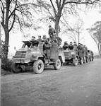 Infantrymen of The Royal Hamilton Light Infantry in General Motors C15TA armoured trucks, Krabbendijke, Netherlands, 27 October 1944. October 27, 1944.