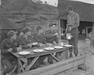 Sappers of the 23rd Field Squadron: L. to R.: Sappers G.A. Gravelle, D.E. Appleby, N.W. Parkins, L/Cpl. A.E. Perry, and the cook Pte. N.G. Knox. Korea, March 1952. Mar. 1952