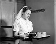 Nursing Sister Brooke, a dietician at the Royal Canadian Naval Hospital, St. John's, Newfoundland, 17 July 1943. July 17, 1943.