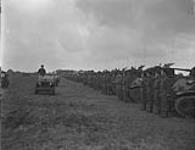 Inspection of the 5 Canadian Armoured Ddivision by General Crerar, GOC in C, 1st Canadian Army, Eelde airport, Netherlands, 23 May 1945. 23 MAY 1945