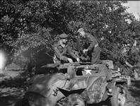 Maj. Gen. D.C. Spry on board armoured vehicle. 31 Aug. 1944