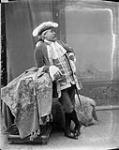 J. A. Lowell, M.P., dressed as M. De Chavigny in the group representing the "Foundation of Montreal and Settlement of Surrounding District, 1641-1670" at an historical costume ball février 1896.