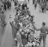 Dutch civilians celebrating liberation of Utrecht by units of the 1st Canadian Corps. 7 May 1945