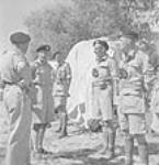 General Sir Bernard Montgomery meeting Lieutenant-Colonel C. Neurotsos, Commanding Officer, 14th Armoured Regiment (The Calgary Regiment) 20 Aug. 1943