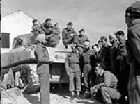 Troopers of The Calgary Regiment  teaching  infantrymen of the 8th Indian Infantry Division about tank warfare, Castel Frentano, Italy, 30 March 1944. March 30, 1944.