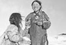 [Agartuq (left) and Martha Okutaq (right).]. 1949-1950