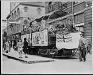 Quebec Railway, Light & Power Co. observation car during a Victory Bond campaign, corner of St. Joseph and Crown streets. 1943