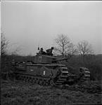 Tank of 12th Canadian Army Tank Regiment (Three Rivers) taking part in exercise 'Spartan'. 8-10 Mar. 1943