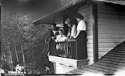 Watching Regatta from balcony, Rosseau Lake, Muskoka Lakes. ca. 1907