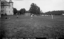 Elgin House-Port Sandfield Baseball Game, Elgin House at the bat, Muskoka Lakes. ca. 1909