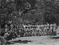 Personnel of the Calgary Regiment visiting personnel of the 1st Battalion, 5th Mahratta Light Infantry, Indian Army. 28 Aug 1944