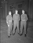 CANADIANS IN ENGLAND. C.S.M. Geo. Mitchell, S/Sgt. Edward Hughes Dearden and Pte. Walter Frederick Cooper. 12 Feb. 1945