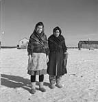 Two Cree Indian women wearing apparel typical of their tribe. Jan. 1946