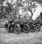 Personnel of the Cameron Highlanders of Ottawa on motorcycles near Caen, France, 15 July 1944. July 15, 1944.