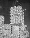 Interlocking aluminum ingots. Dec 1958