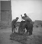 Pioneers of the 122nd Field Company, Royal Engineers, repairing roads. 08-Jul-44