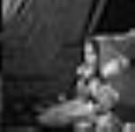 Mme Duval enfilant une aiguille. [Aulaqiaq, épouse de William Duval. Bien qu'aveugle, elle était capable d'enfiler une aiguille et de coudre.]. Août 1946