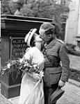 The wedding of Captain Leonard Johnson of the 4th Anti-Tank Regiment, Royal Canadian Artillery (R.C.A.), and Miss Josephine Devries at the Pepergasthuis Church, Groningen, Netherlands, 30 June 1945. June 30, 1945.