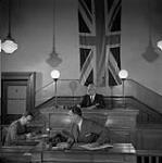 [Magistrate Oliver Milton Martin directing court proceedings]. [ca. 1955]