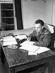 Sergeant Frank Hazelwood, Royal Canadian Army Service Corps (R.C.A.S.C.), who is studying Biology and English at the Khaki University of Canada, Leavesden, England, 21 September 1945. September 21, 1945