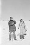 Inuit family - mom, dad and baby 1951.