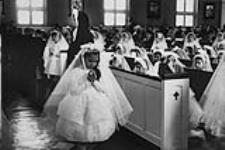 Daughter Toni's first communion and confirmation [graphic material] 1960.