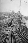 (Quebec Bridge Disaster) The unbroken chain of eye-bars of the top chord of the Quebec side. "1907", 1908