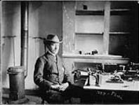 Marconi and his instrument [inside Cabot Tower] Signal Hill, St. John's, Nfld December 12, 1901.