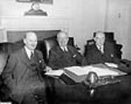 Rt. Hon. Clement Attlee, President Harry Truman and Rt. Hon. W.L. Mackenzie King  concluding talks on atomic energy. 12 - 15 Nov. 1945