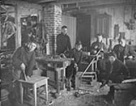 Boys' class in carpentry at Sir Wilfred Grenfell's mission school at St. Anthony, Nfld., c. May 1906. ca. May 1906