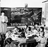 Japanese children from internment camp attend local school. July 1945
