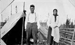 (Treaty 9) John Wesley and his wife, interpreter during Treaty Negotiations with Indians at Windigo and Deer Lake, Ont 1930