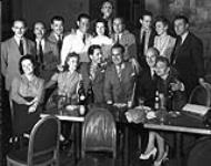 Customers posing for the camera at their table at the Standish Hall Hotel. ca 1941 - 1952.