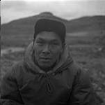 Paulassie Pootoogook, an Inuit artist at Cape Dorset, Northwest Territories [Cape Dorset (Kinngait), Nunavut]  1960.