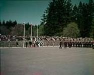 Cadets at Royal Roads Graduation march past Minister of National Defence Brooke Claxton. 1954