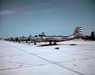 Royal Canadian Navy McDonnell F2h-3 Banshee fighter jets lined up on the tarmac at Boca Chica Field, Key West Florida Feb 18, 1957 (2 envelopes) Feb., 18, 1957