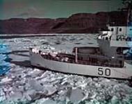 Bow of HMCS LABRADOR in ice proceeding through Bellot Strait. 24-Aug-57